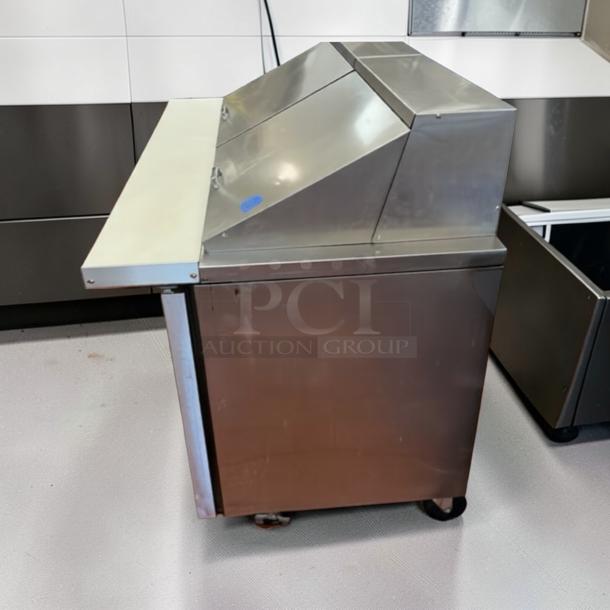 Prime Condition True TSSU-48-12-HC refrigerated sandwich prep table, 48” stainless steel, tested, operational. Made in USA.