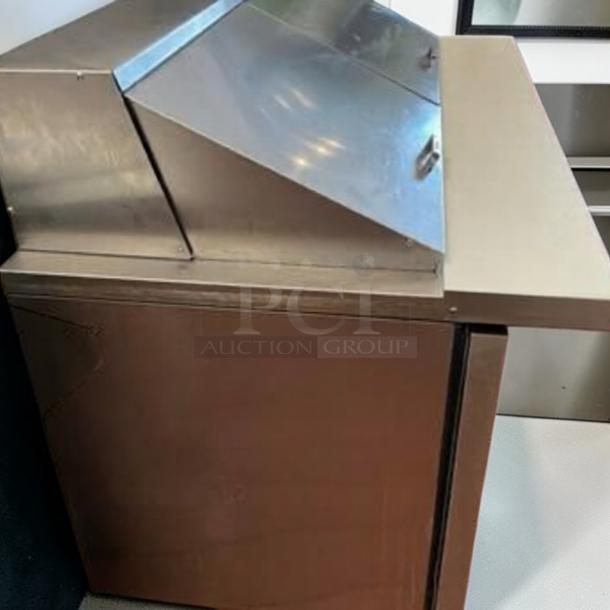 Prime condition True TSSU-48-12-HC refrigerated sandwich prep table, 48" stainless steel, fully tested. Made in USA.