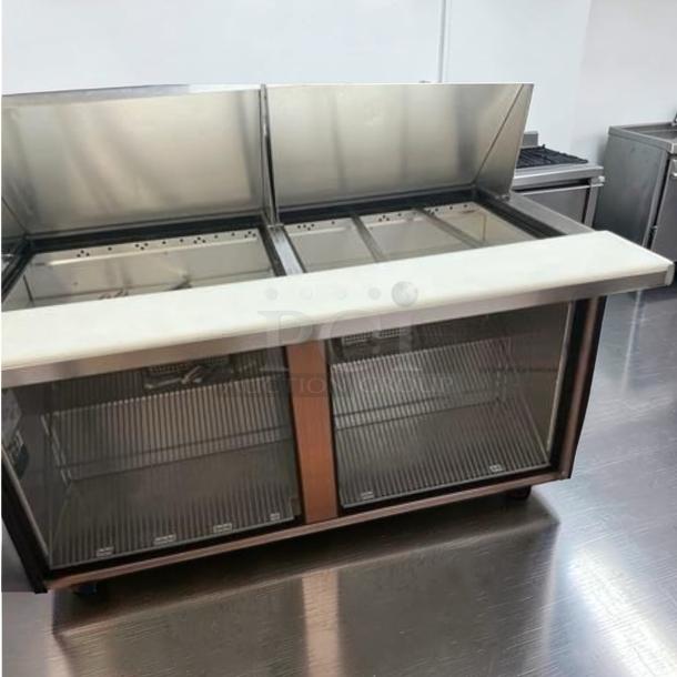 True TSSU-60-24M-B-ST-HC sandwich prep table. Superior condition, 60" 2-door, 24 pan capacity, made in USA.