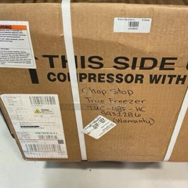 Boxed True TUC-48F-HC ADA undercounter freezer, stainless steel, 48.5", two-door, new with warranty label.