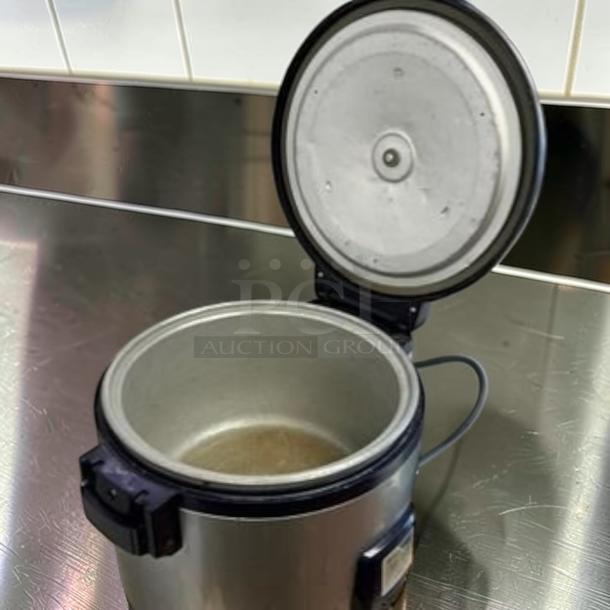 Commercial electric rice cooker, stainless steel, large capacity. Remarkable condition, fully tested, and operational. Model RICE-M-COOKER-0764.