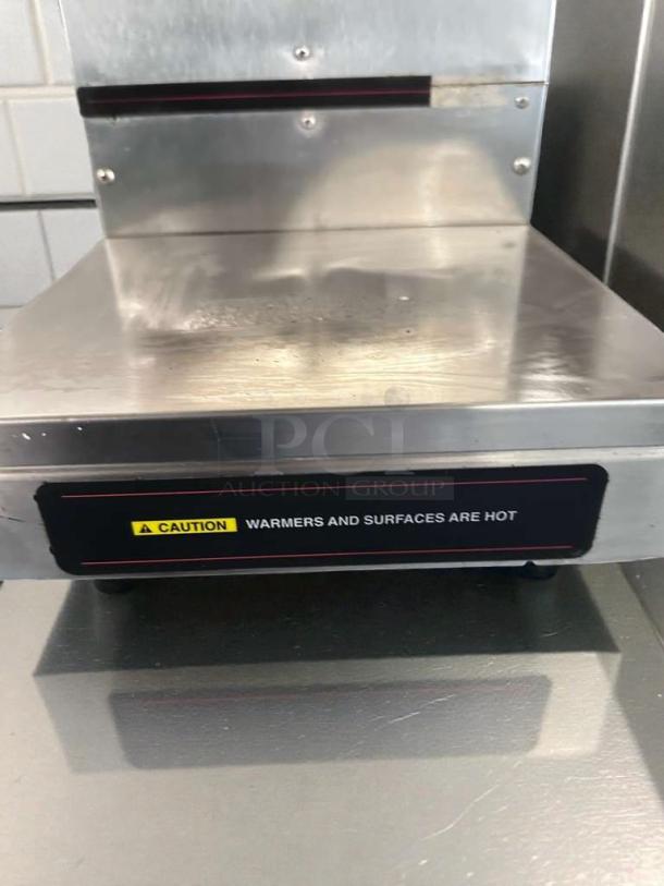 Cecilware JVA20B coffee dispenser, stainless steel, premium condition, 120V, UL listed, "Caution: Warmers are hot" label.