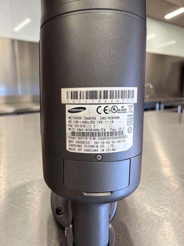 Samsung iPOLIS SNO-6084RN HD network bullet security camera. Excellent condition, PoE/12V/24V, fully tested. Label visible.