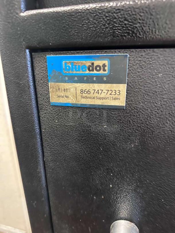 Bluedot Safes depository drop safe with a digital SecuRam ProLogic lock. Label shows model details and support contact.
