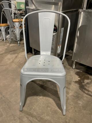 Like new Astor Series silver dining chair, welded design, suitable for indoor/outdoor use. Model: Astor. 6 available per bid.