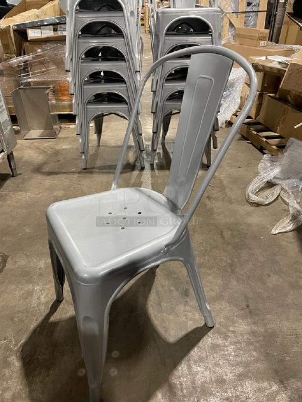 Astor Series silver dining chair, high-quality welded design, like new. Ideal for indoor/outdoor use. Stackable, set of 6.