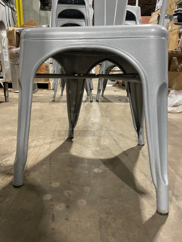 LIKE NEW silver Astor Series dining chairs. Welded metal, ideal for indoor/outdoor use. Set of 6.