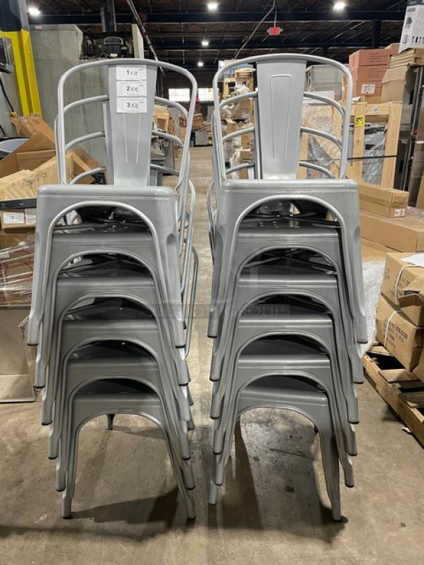 Stacked set of Astor Series silver welded dining chairs in like-new condition. Suitable for indoor/outdoor use.