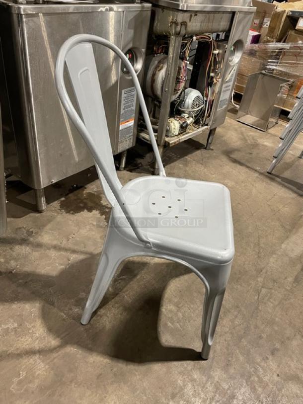 Astor Series Ilver dining chair, metal frame, like new condition, welded design, suitable for indoor/outdoor use.