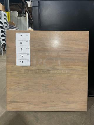Golden Ash full wood table top, like new condition, square shape, with a smooth finish, visible labels indicating quantity.