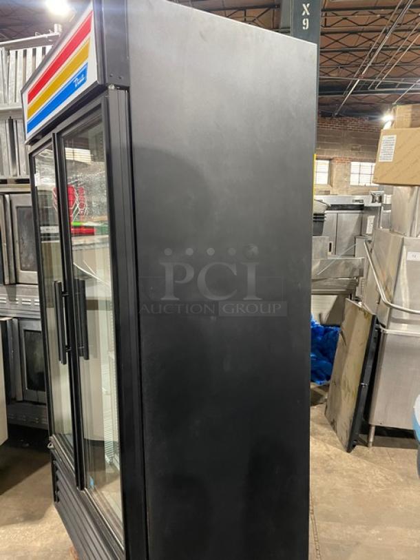 True 2 Door Reach In Cooler Merchandiser, Model GDM35LD. Late model with glass doors. Serial 8466398. Excellent condition.