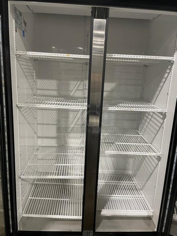 True 2 Door Reach-In Cooler Merchandiser, Model GDM 35LD, features spacious shelving, excellent condition, serial 8466398.