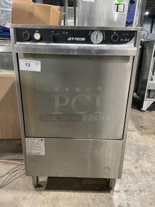 Jet Tech X-33 undercounter stainless steel dishwasher with rack, model X-33, serial 152048874, 115V, 1 Phase, on legs.
