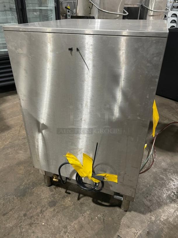 Jet Tech X-33 under-counter stainless steel dishwasher with rack, 115V 1Phase, on legs, minor external wear visible.