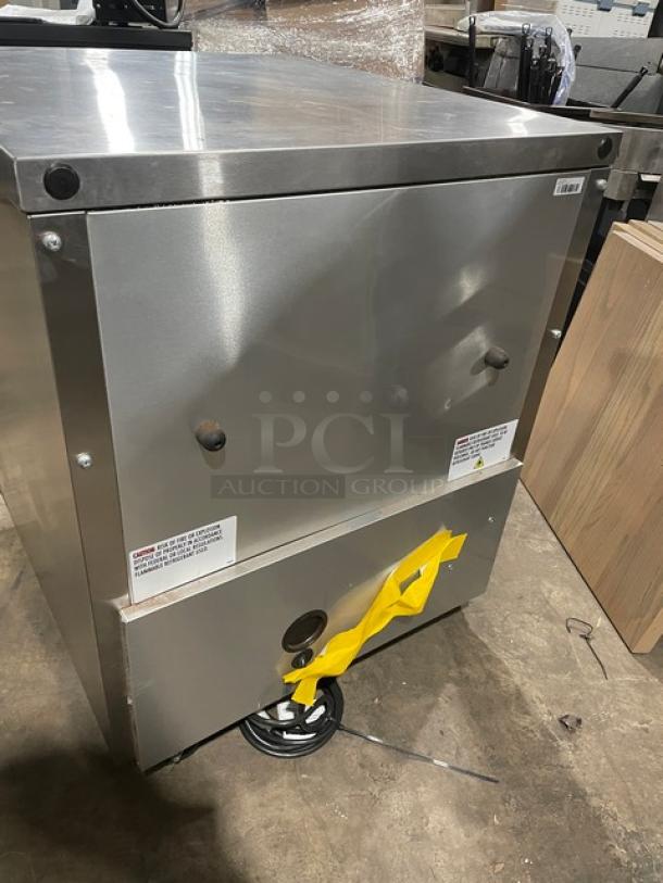 True one-door stainless steel refrigerated lowboy, Model TUC27HC, on casters. Serial 8732318, 115V, good condition.