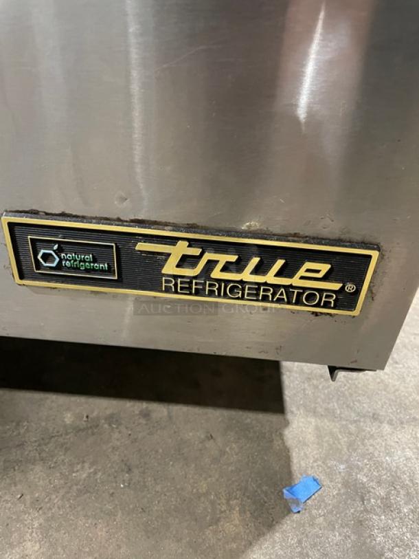 True TUC27HC stainless steel lowboy cooler, one door, natural refrigerant label, on casters, serial 8732318. 115V, 1 phase.