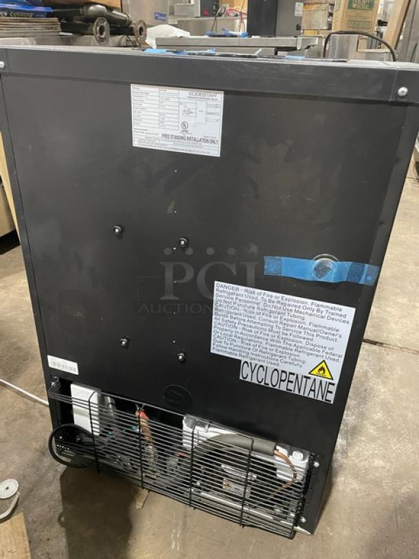 Edgestar BR3002BL one-door kegerator, 115V, on casters, shown from the back with warning labels and serial number A21013130646.