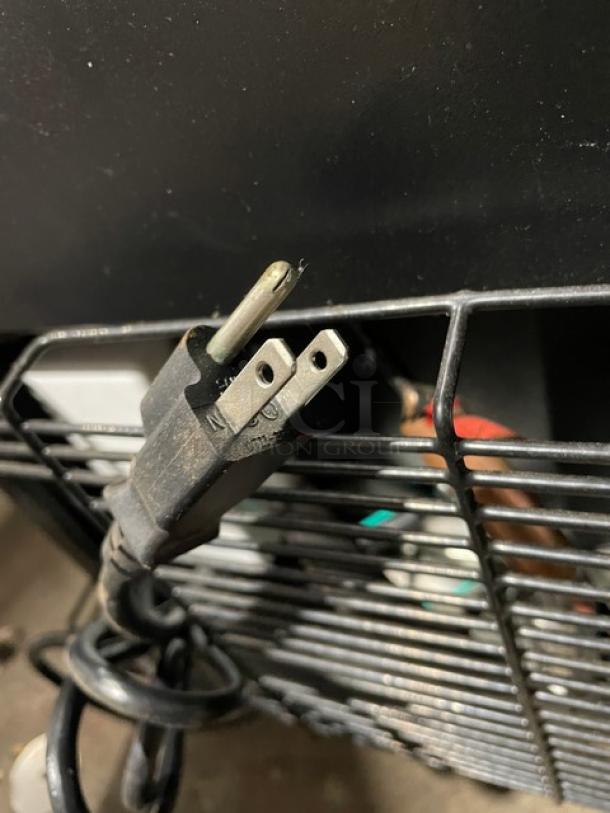 Edgestar one-door kegerator model BR3002BL, black plug, model label visible, new condition with keg and casters.