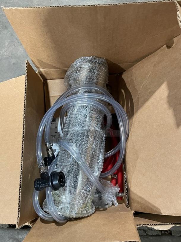 Edgestar BR3002BL kegerator packaged in a box with tubing and attachments, new condition, model and serial details visible.