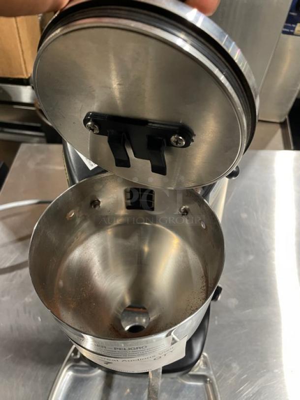 Mazzer Luigi Super Jolly espresso bean grinder, open chamber view, stainless steel, model and serial number visible, 115V.