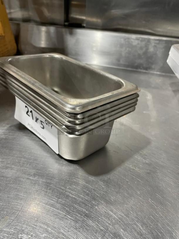 Stainless steel steam table pan stack, commercial-grade, lightly used. Label indicates "21x5 qty" available.