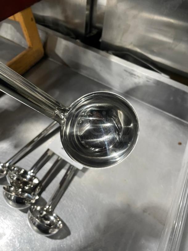 Winco Commercial Stainless Steel 3oz Ladle, Model LDI-3, features a shiny finish, ideal for professional kitchens.