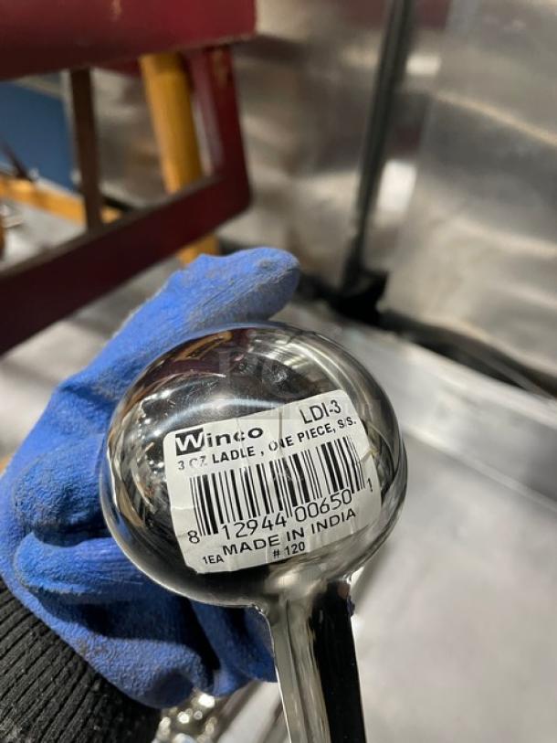 Winco LDI-3 stainless steel ladle, 3oz, one piece, label shows model and "Made in India", in excellent condition.