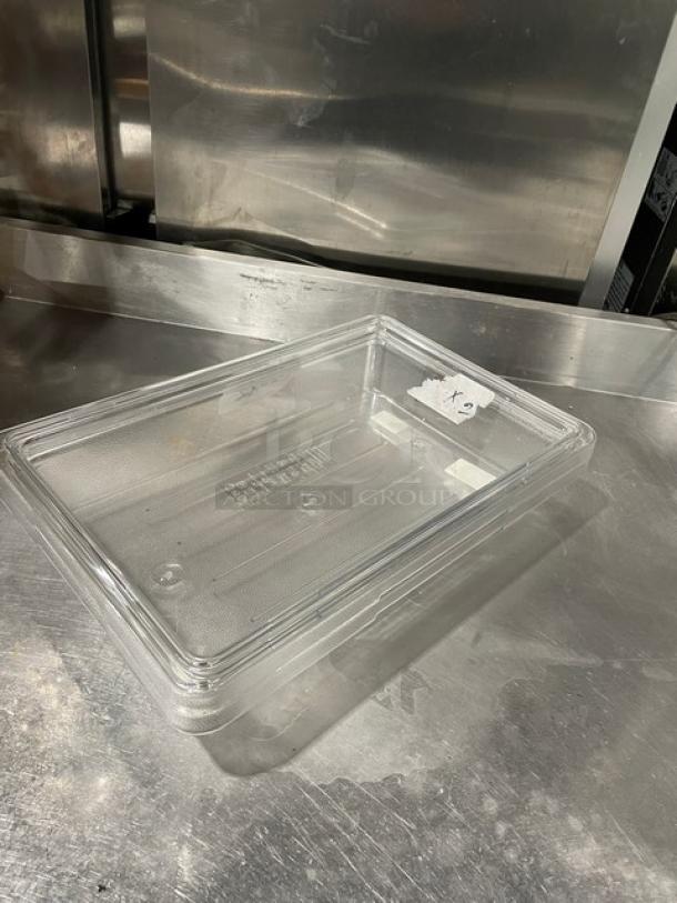 Rubbermaid Commercial clear polycarbonate food storage container, model 3307, 18x12x3.5 inches, excellent condition.