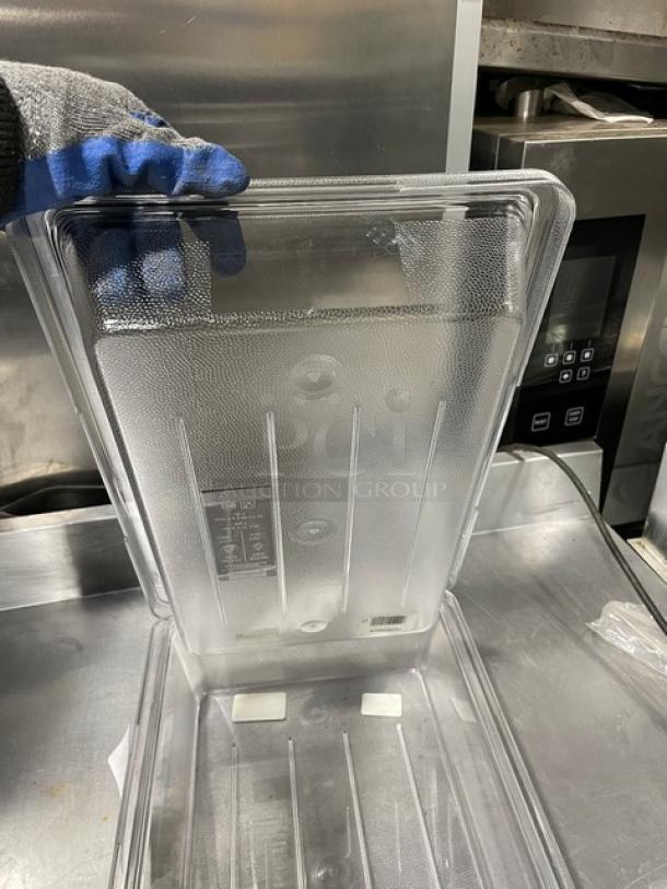 Rubbermaid Commercial Clear Polycarbonate 18x12x3.5" Food Storage Container, Model 3307, shown in good condition.