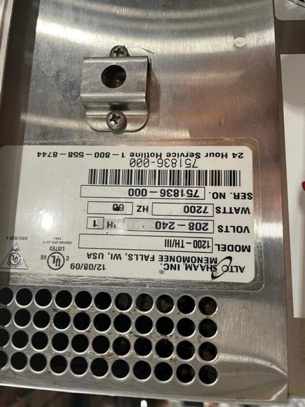 Alto-Shaam 1200THIII Cook & Hold Oven label, model 1200-TH/III, SN: 751836-000, 208-240V, 1 Phase, on stainless steel casing.