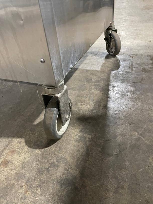 Alto-Shaam Halo Heat 1200-TH/III oven base on casters, showing stainless steel finish and sturdy design.