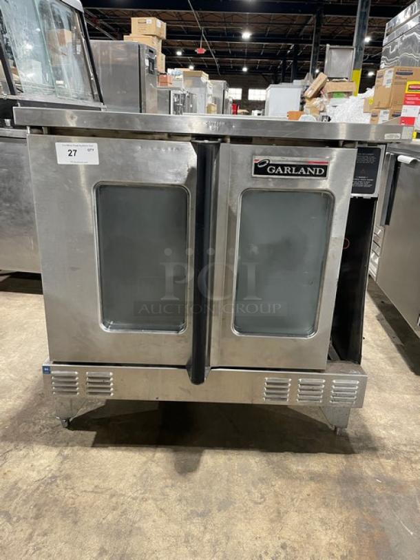 Garland Master Series stainless steel gas convection oven, single stack, on legs, visible control panel, good condition.
