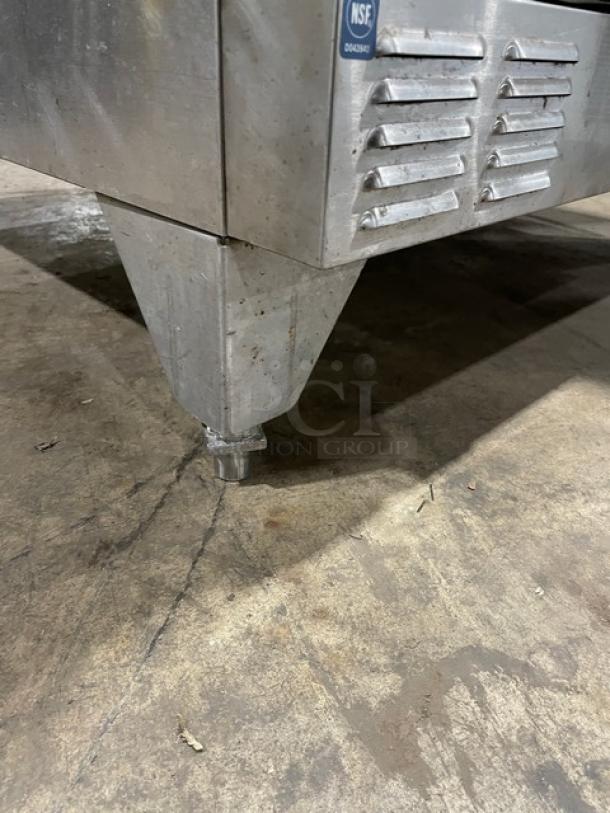 Garland Master Series stainless steel gas convection oven on legs, showing base detail with NSF label, used condition.