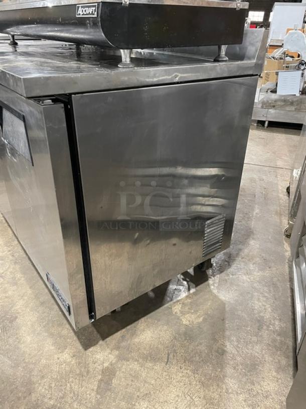 True TWT048 stainless steel 2-door undercounter worktop refrigerator on casters. Model TWT0-48, SN: 1-3991055. 115V, 1 phase.