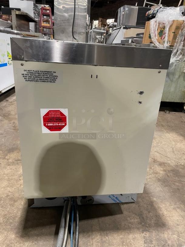 Jet-tech EV18 stainless steel undercounter dishwasher, 208-240V, high-temp, commercial use. Mild wear, warning labels visible.