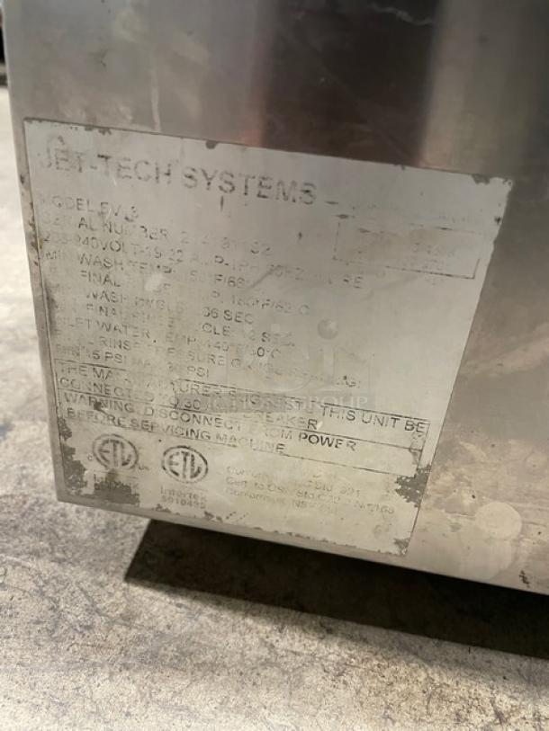Jet-tech EV18 commercial stainless steel undercounter dishwasher, electric powered, 208-240V, visible wear on label.