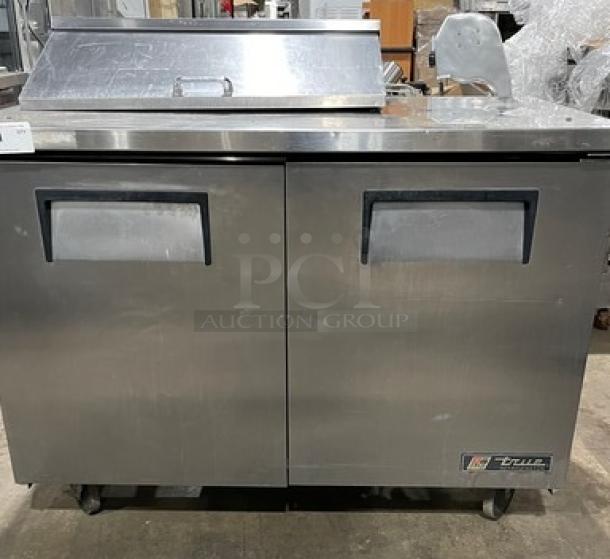 True Commercial 2-Door Stainless Steel Undercounter Refrigerator, Model TSSU-48-08, SN: 4940880, on casters, excellent condition.