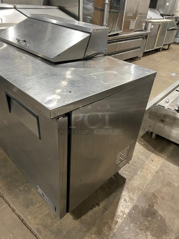 True TSSU-48-08 stainless steel 2-door undercounter refrigerator, model 4940880, on casters, commercial-grade, 115V, 1 phase.