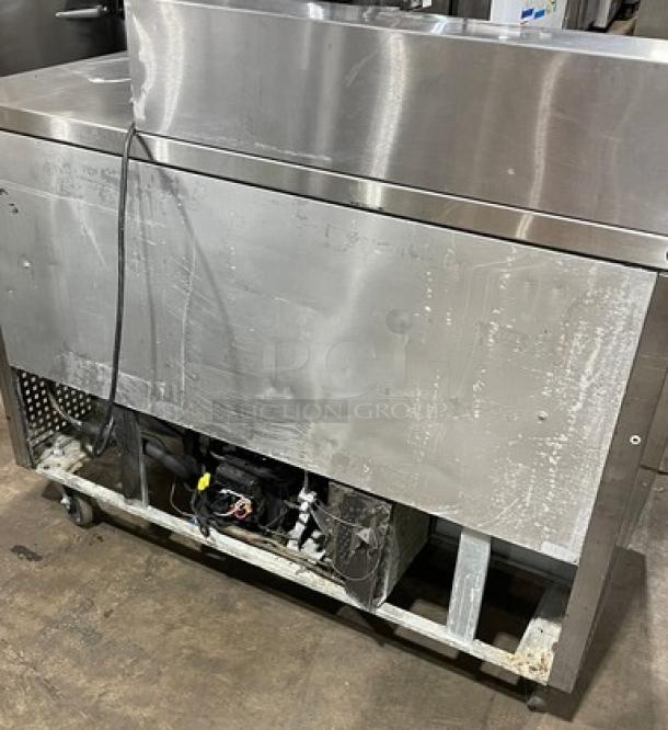 True TSSU-48-08 stainless steel 2-door undercounter refrigerator, model 4940880, on casters, 115V, used condition.