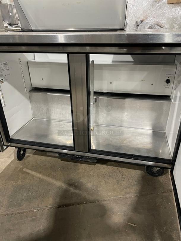 True TSSU-48-08 commercial stainless steel 2-door undercounter refrigerator, model 4940880, on casters, 115V, 1 phase.