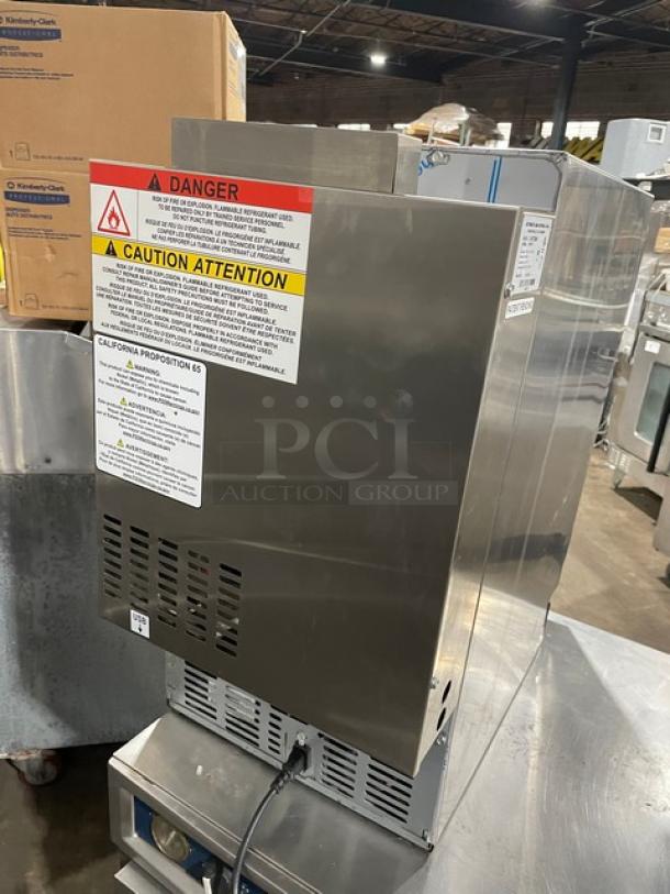 JoeTap JT-NITCOM-R stainless steel nitro cold brew coffee dispenser, dual tap, voltage 115V, commercial use, caution labels visible.