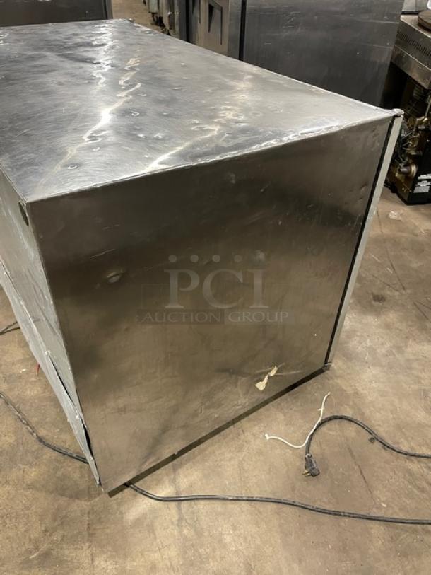 Silver King SK48G commercial undercounter freezer, stainless steel, electric, 2-door, used, with poly-coated rack, 115V.