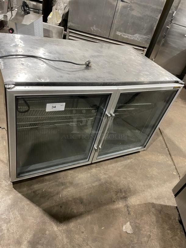 Silver King SK48G stainless steel 2-door glass undercounter freezer, poly-coated rack, electric, model SN: SBAJBCCCCC.