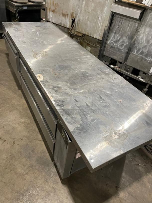 True TSUU-48-08 stainless steel refrigerated pizza prep table, used condition, electric 115V, visible wear on surface.