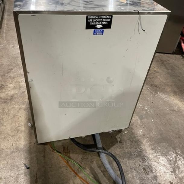 CMA commercial stainless steel undercounter dishwasher, electric powered, Energy Star certified, visible wear, label on rear panel.