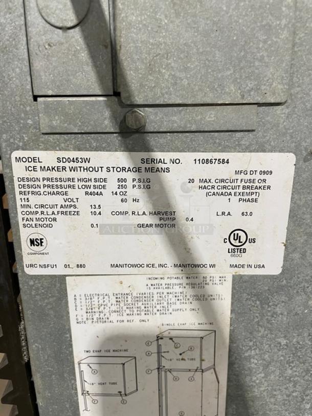 Manitowoc SD0453W ice maker, serial 110867584, 115V, 14 oz R404A refrigerant, NSF and UL listed, good condition, on legs.