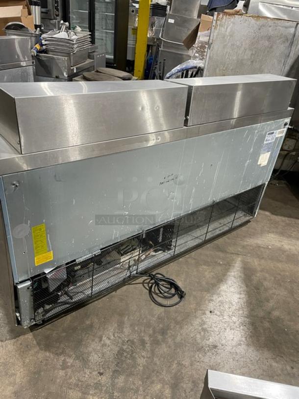 Sun Ice stainless steel refrigerated prep table, Model LUNST72-30, with 2 drawers and 2 doors. 115V, on casters.