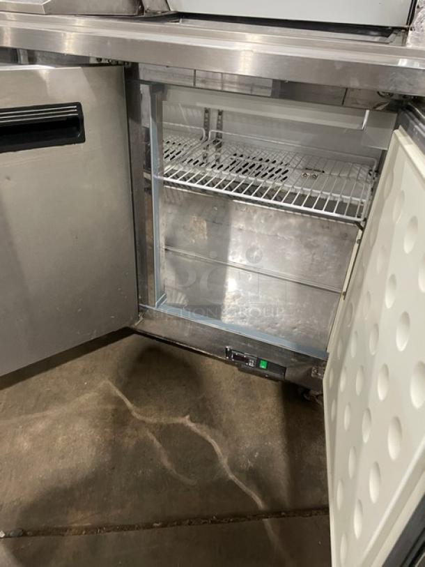 Sun Ice stainless steel 2-drawer, 2-door refrigerated prep table, model LUNST72-30, on casters.