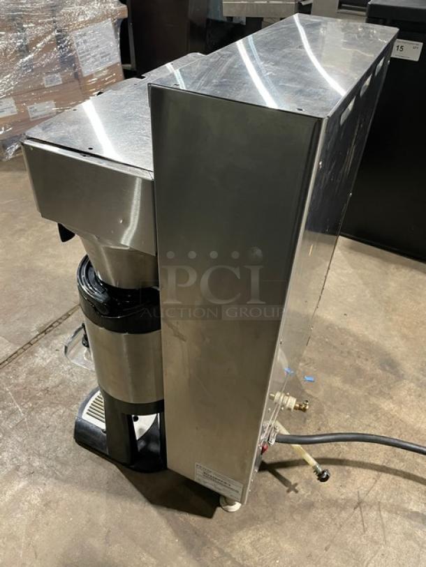 Fecto CBS-2142-XTS commercial coffee brewer with three satellite air pots, stainless steel, on legs, 208-230V, good condition.