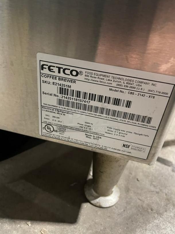 Fecto CBS-2142-XTS commercial coffee brewer label, model and serial number shown. 208-230V, 1 phase, on legs.